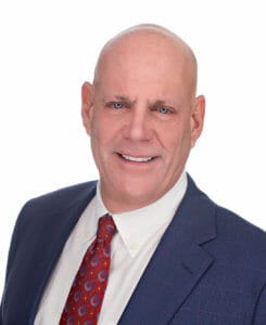 professional headshot of Alan Schrum