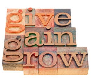 blocks that spell out give, gain, grow