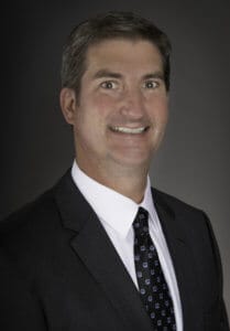 Professional headshot of Joe O'Brien