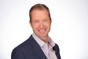 Professional headshot of Cory Brown