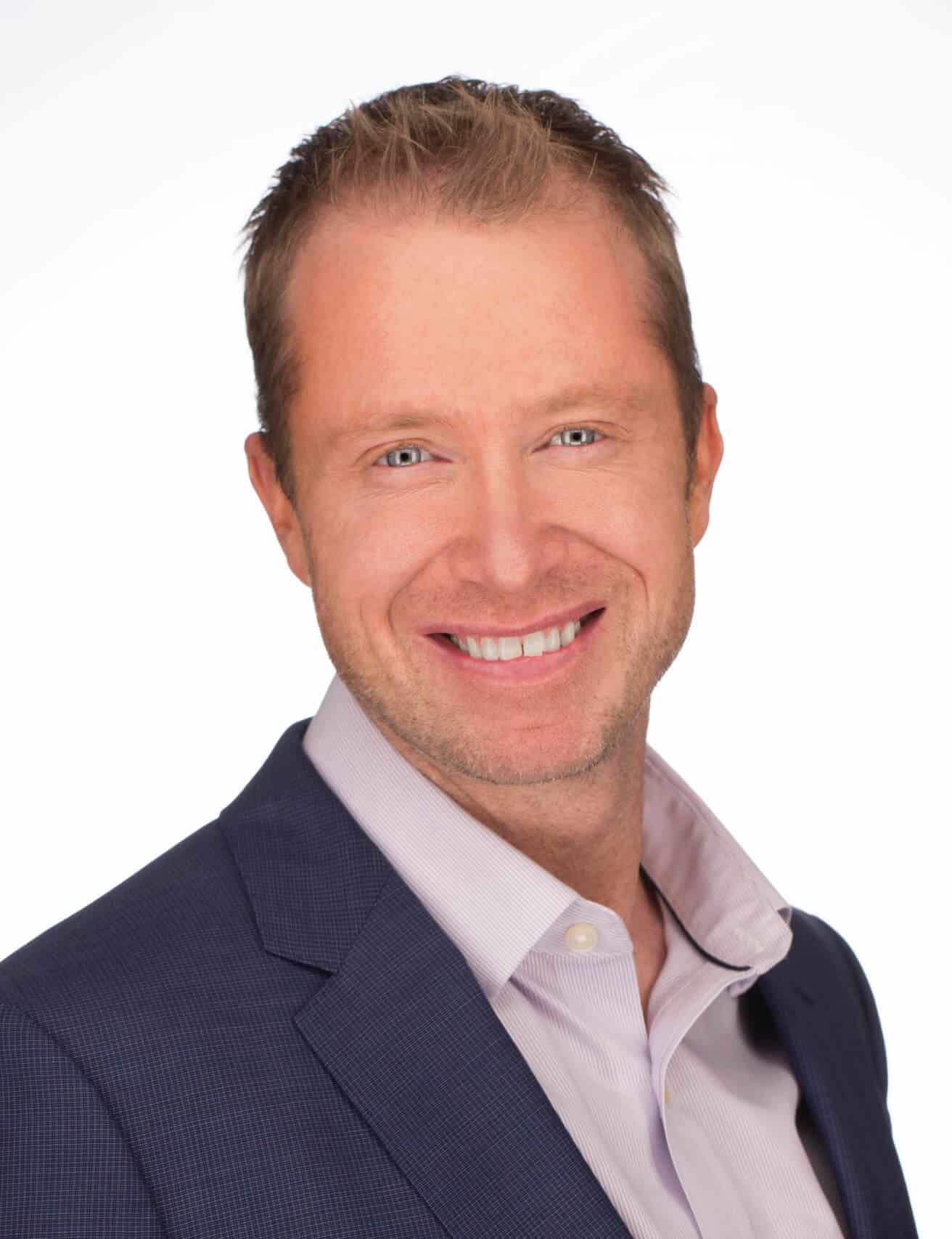 Professional headshot of Cory Brown