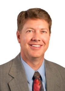 Professional headshot of Craig Disney