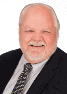 Professional headshot of Hank Leines