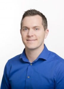 Professional headshot of Justin Crowley