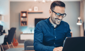 Business man working on computer while at home
