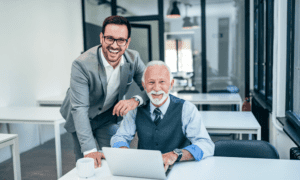 Father and son working together in a family office