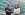 Two business professionals crossing arms looking at camera