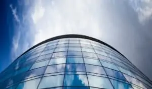 image of glass windows of a curved office front