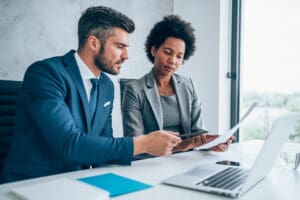 Business people having a meeting in the office - how to maximize your LTV when your borrow